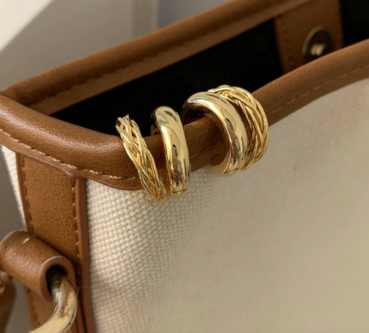 Double-layer twisted metal earrings - Golden